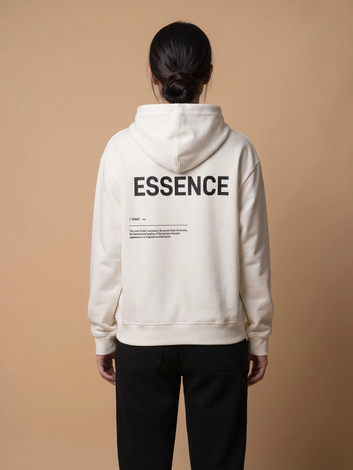 White heavyweight hoodie in organic cotton, Unidentity Soul Hoodie, back view of the black ESSENCE print worn by woman, streetwear from the UAE #color_white