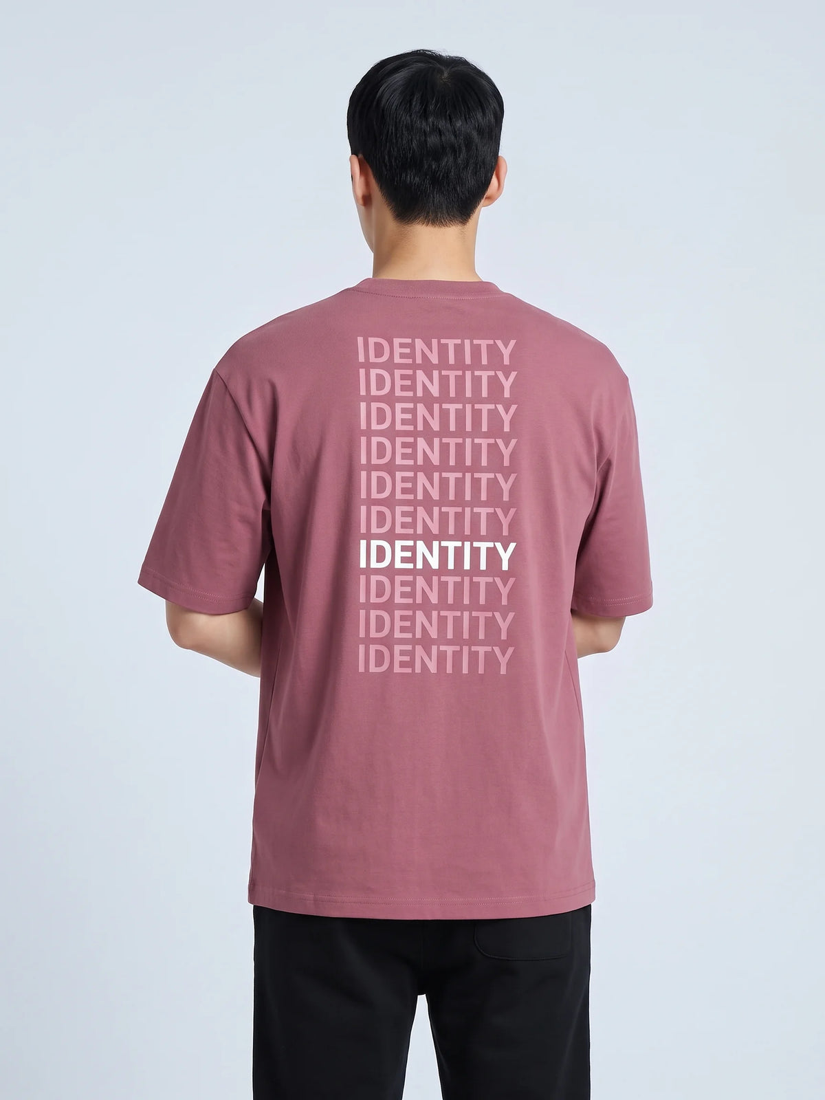 Plum heavyweight oversized t-shirt in organic cotton, Unidentity Identity Tee, back close-up of the white IDENTITY print, 210gsm, from Dubai #color_plum