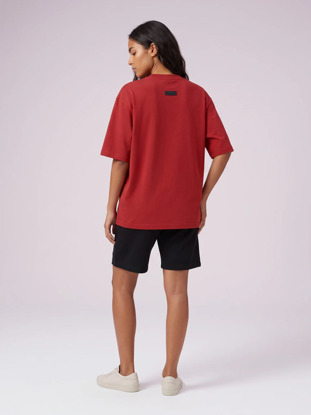 Red heavyweight oversized t-shirt, Unidentity Foundation Oversized Tee, full-length back view worn by woman with black Core Regular Fit Shorts, 210gsm #color_red