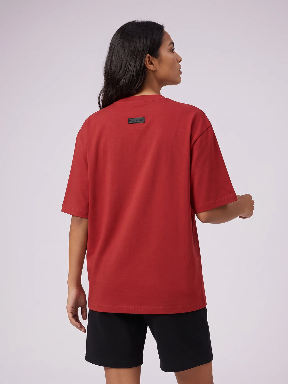 Red heavyweight oversized t-shirt in organic cotton, Unidentity Foundation Oversized Tee, back close-up of the black 3D patch, 210gsm UAE streetwear #color_red
