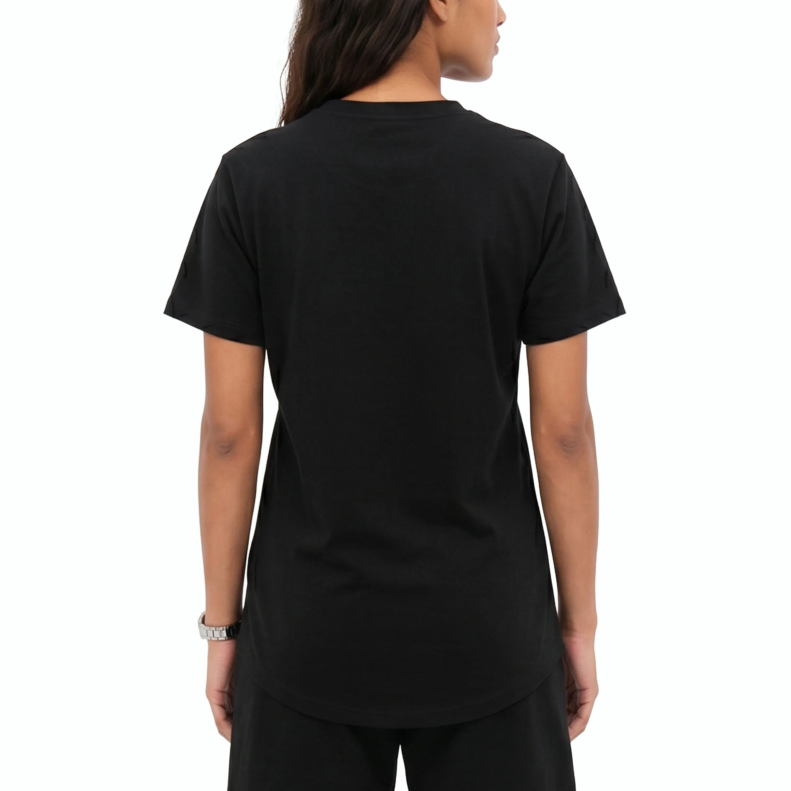 Model wearing black T-shirt, back view. #color_black