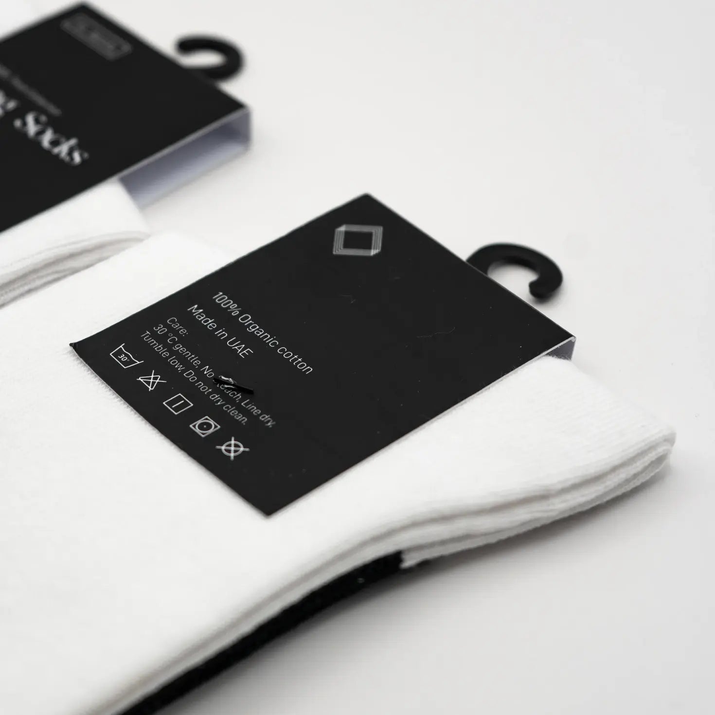 White socks with black label