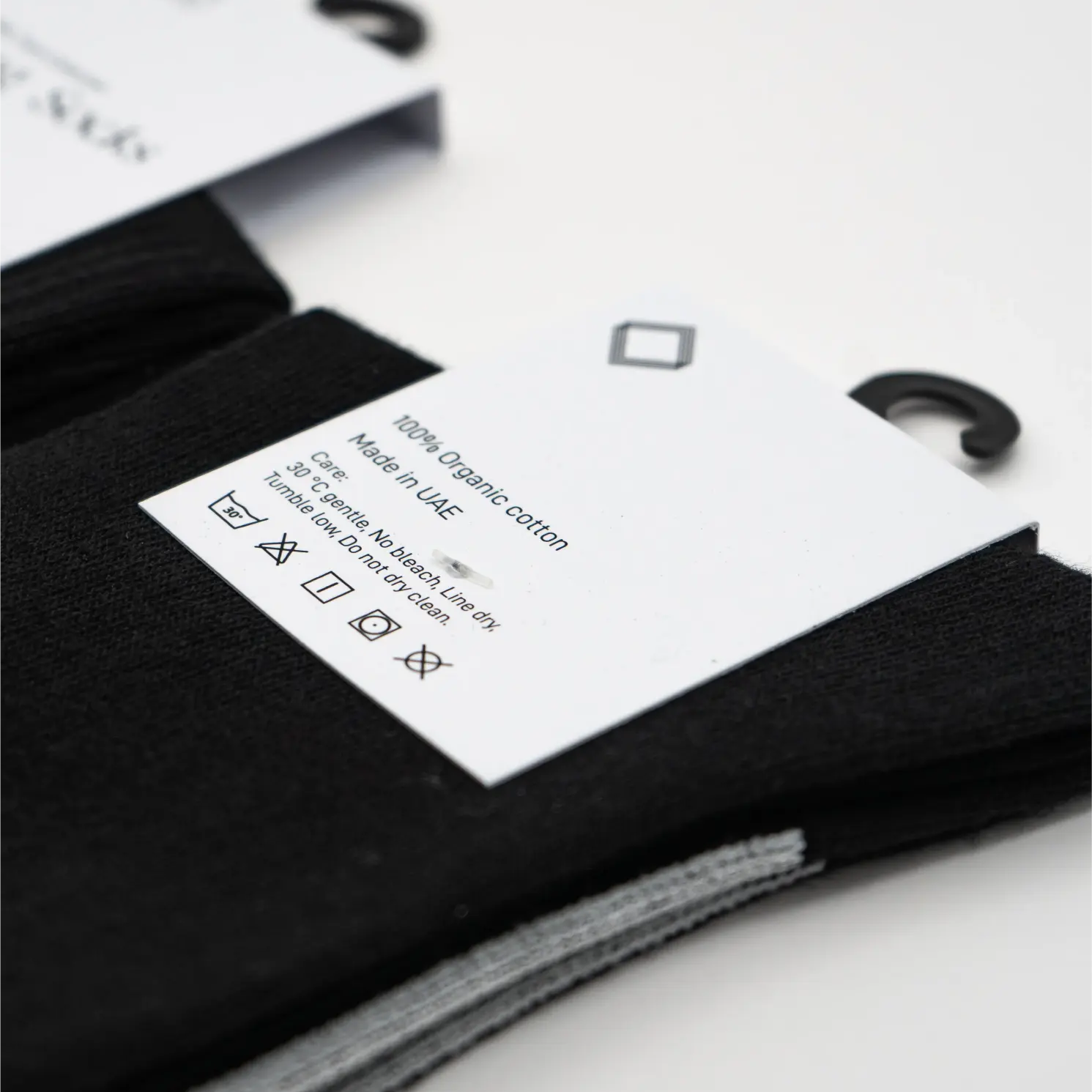 Black socks with a clothes label