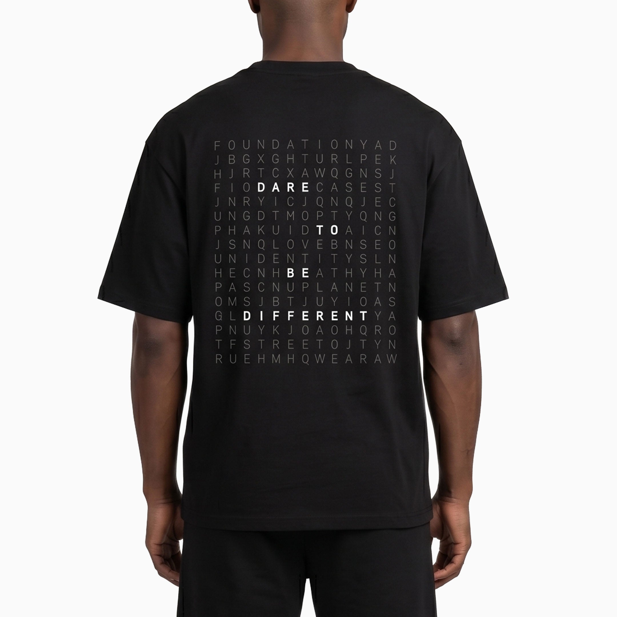 Black t-shirt with text design on the back worn by a person #color_black