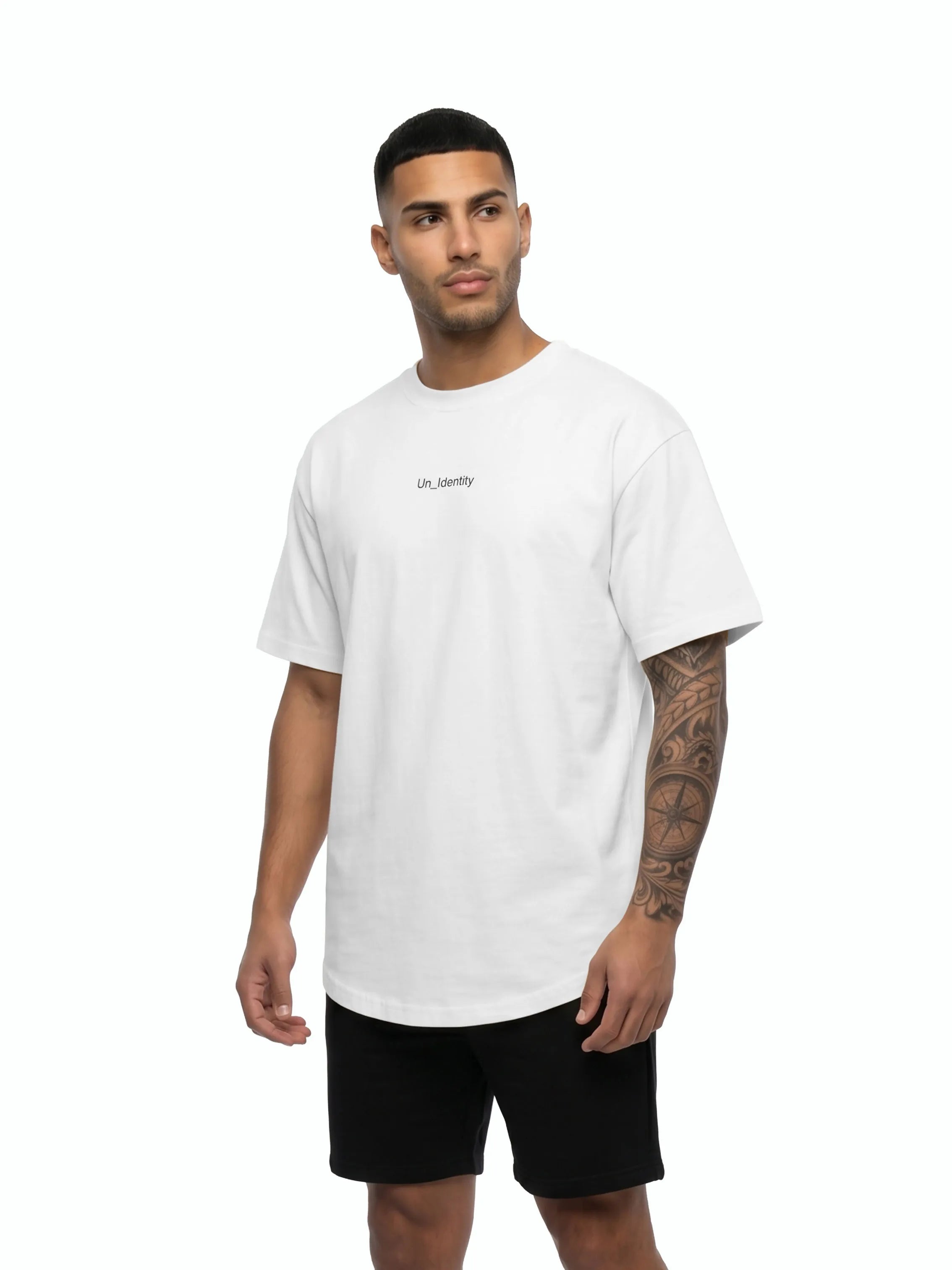 Man wearing Unidentity white tee and Shorts. #color_white