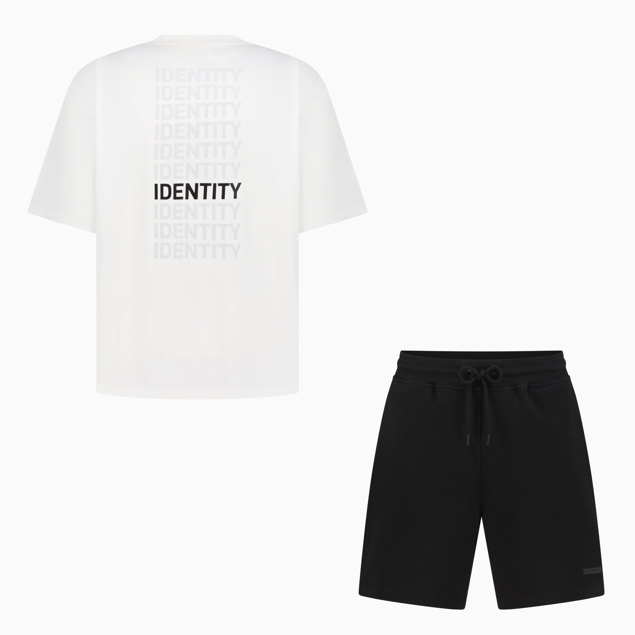 White T-shirt with identity text and black shorts