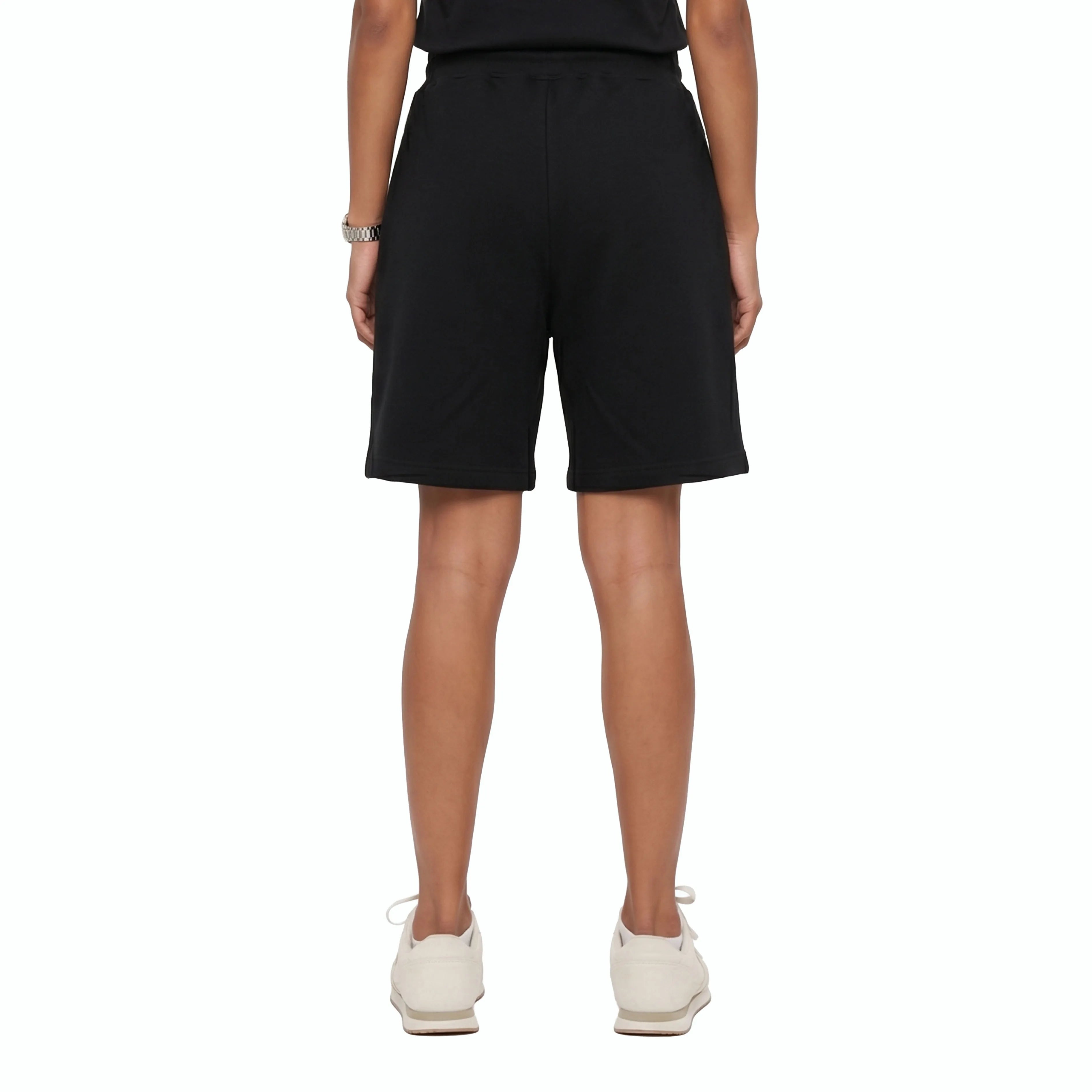 Model wearing black shorts