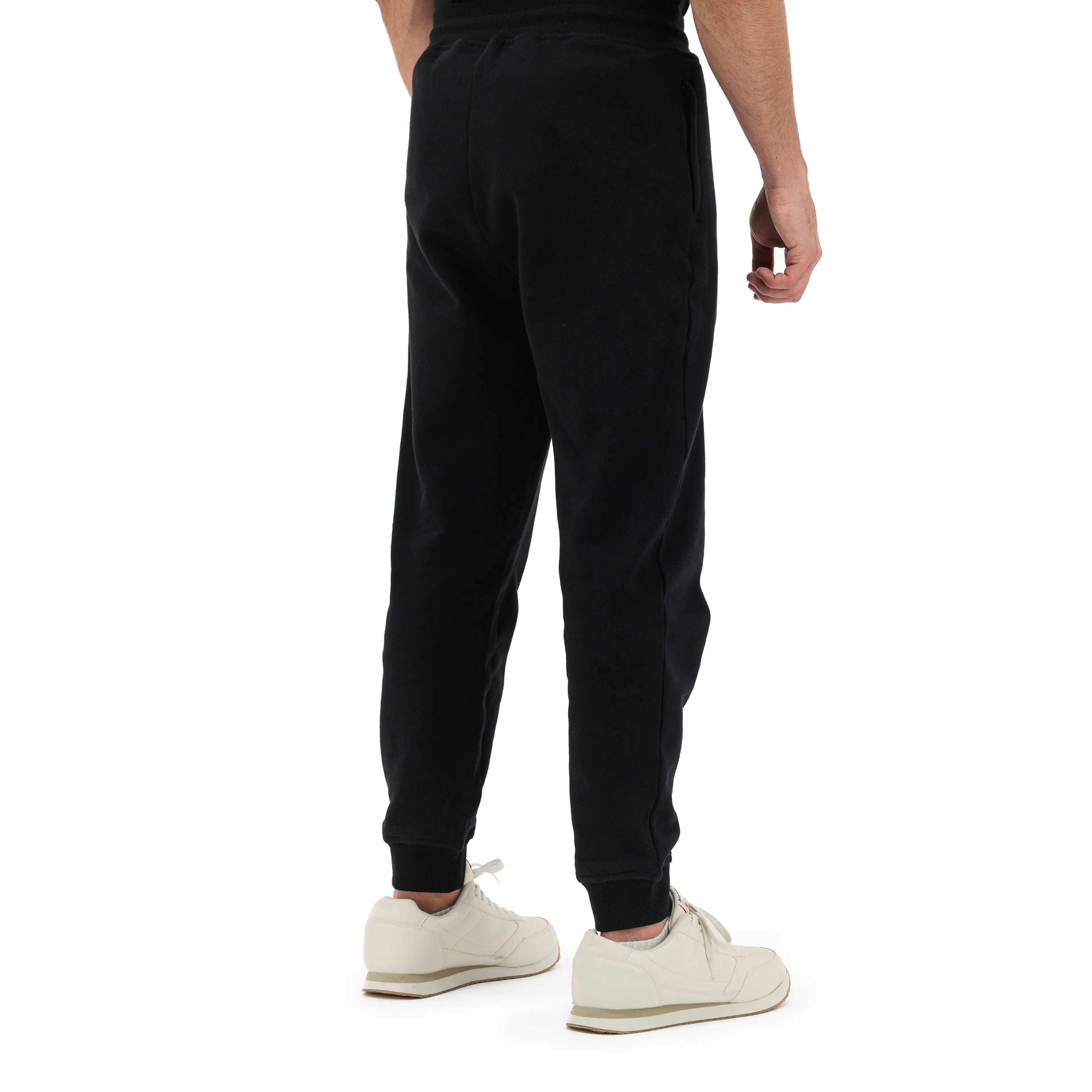 Model wearing black Unidentity sweatpants