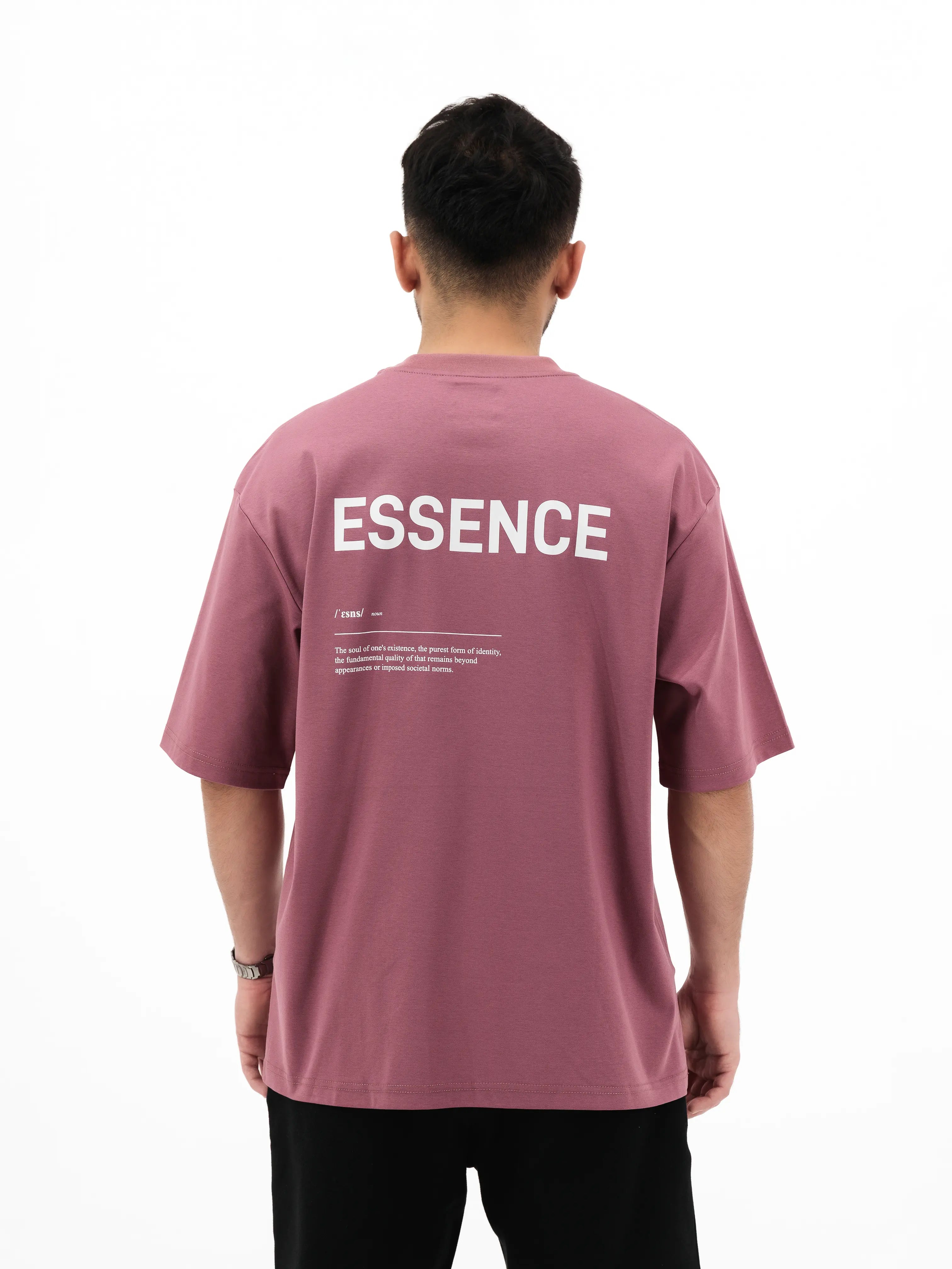 Man wearing plum tee with ESSENCE printed on the back