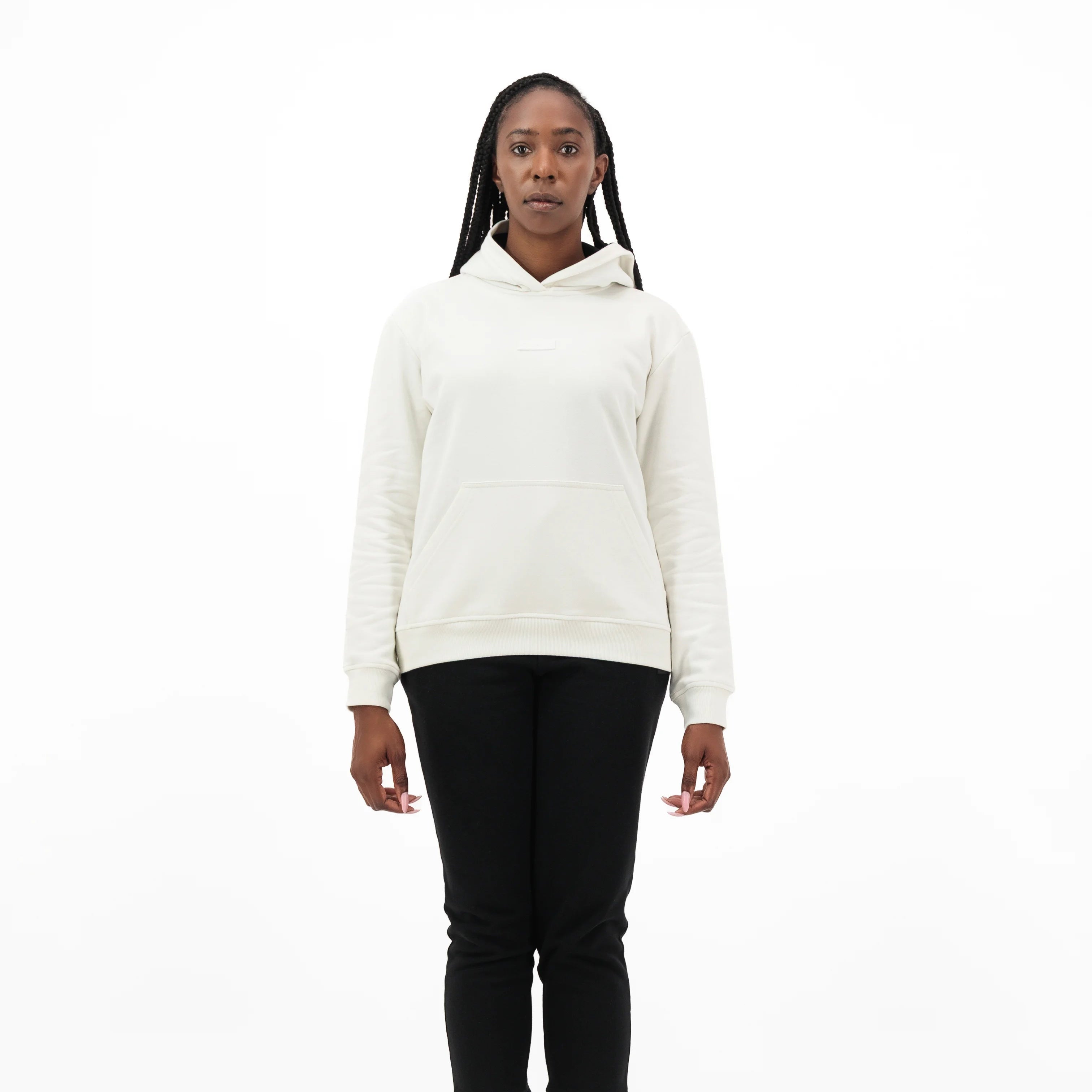 Woman wearing white Unidentity hoodie and black pants. #color_white