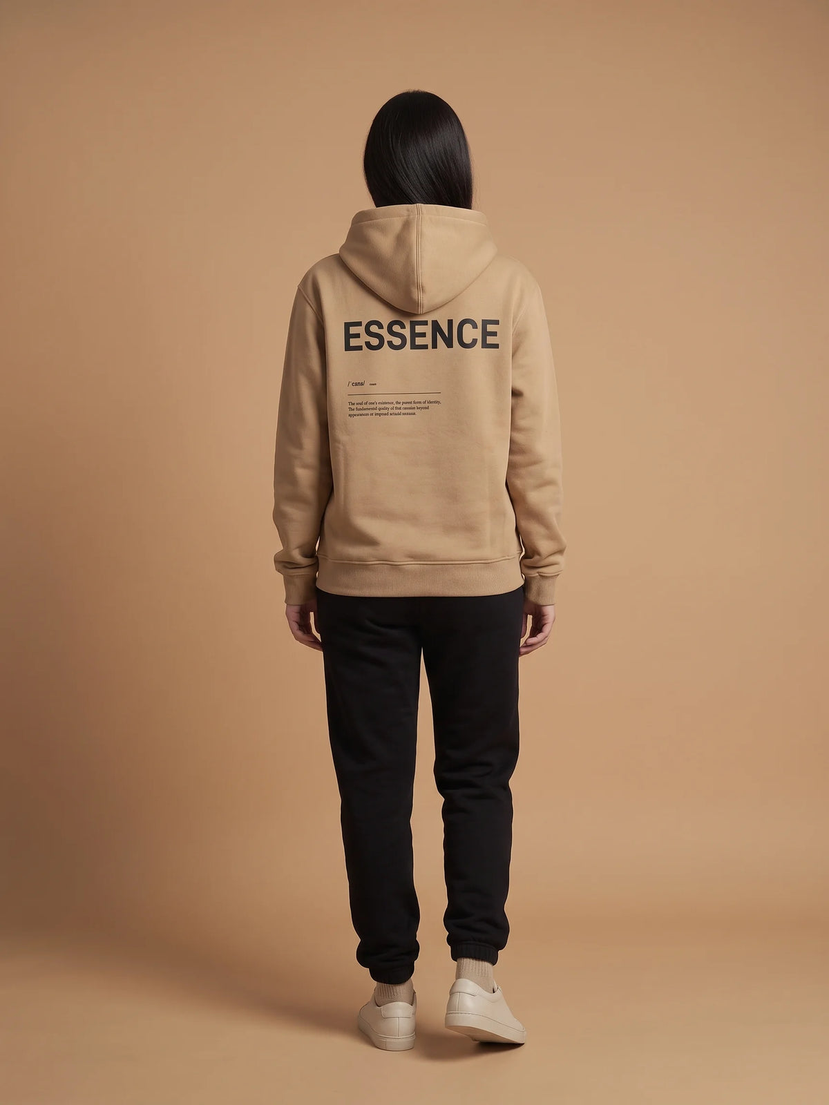 Beige heavyweight hoodie in organic cotton, Unidentity Soul Hoodie, full-length back view of the ESSENCE print on woman, streetwear from the UAE #color_beige