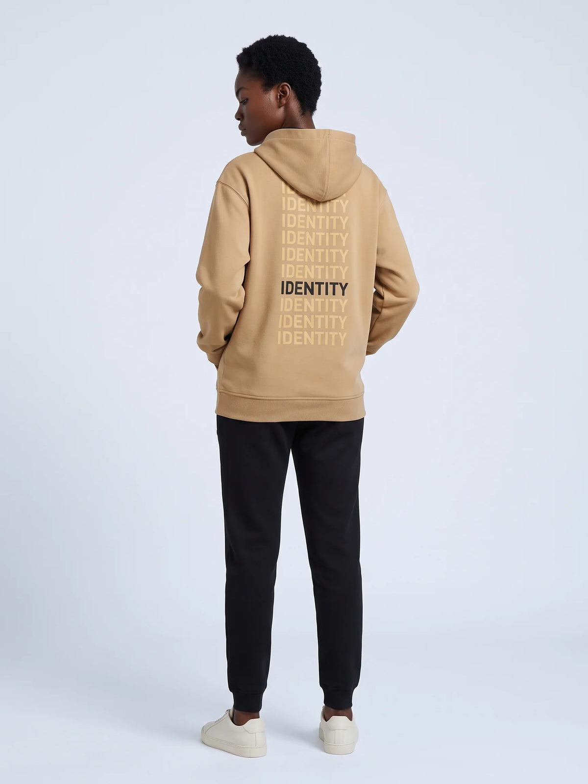 Beige regular fit hoodie in organic cotton, Unidentity Identity Hoodie, full-length back view of the IDENTITY print, sustainable fashion #color_beige