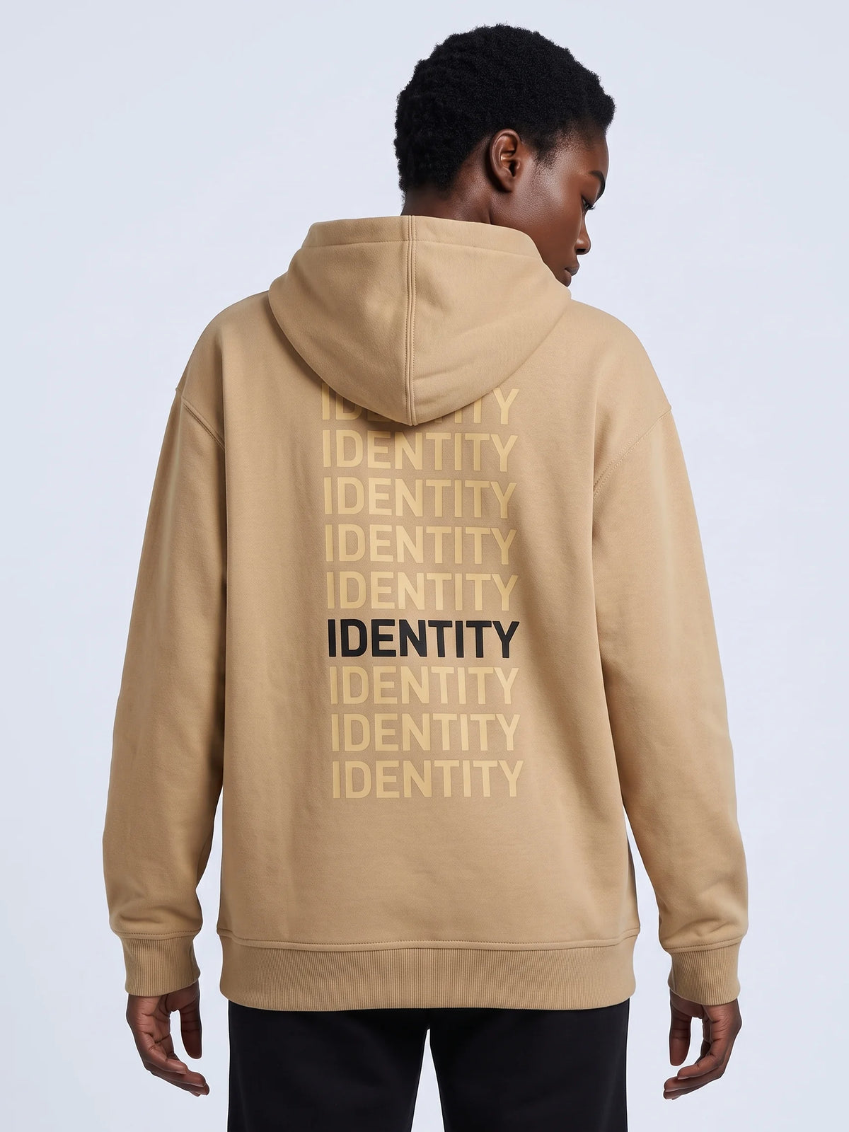 Beige heavyweight hoodie in organic cotton, Unidentity Identity Hoodie, back close-up of the IDENTITY print below the hood, 390gsm, from Dubai #color_beige