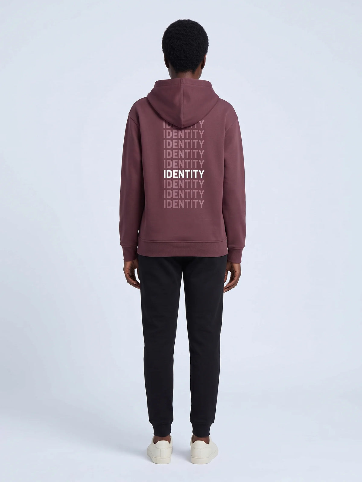 Plum heavyweight hoodie in organic cotton, Unidentity Identity Hoodie, back view of the IDENTITY print with black Core joggers, UAE streetwear #color_plum