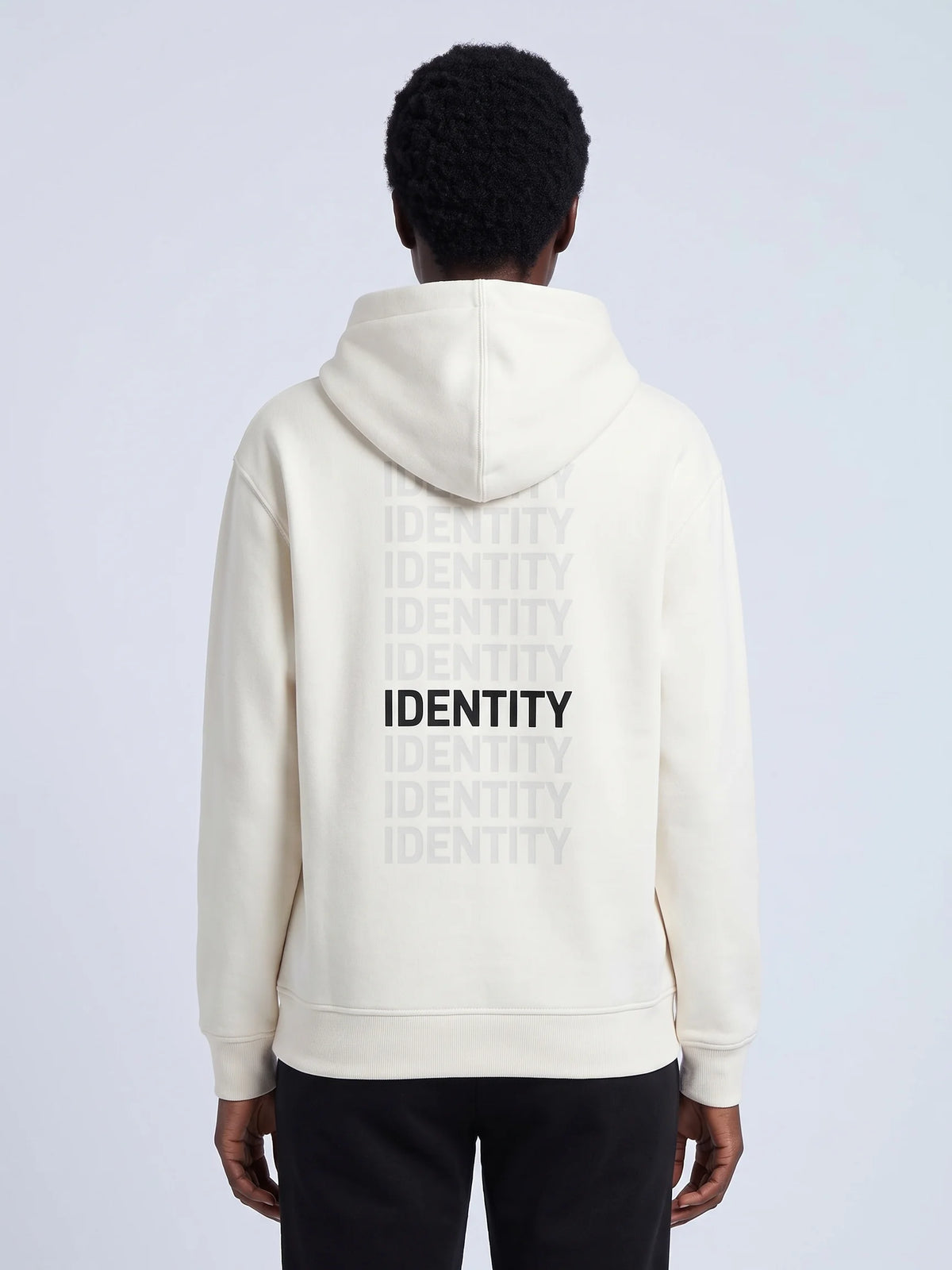 White heavyweight hoodie in organic cotton, Unidentity Identity Hoodie, back close-up of the gray and black IDENTITY print, 390gsm, from Dubai #color_white