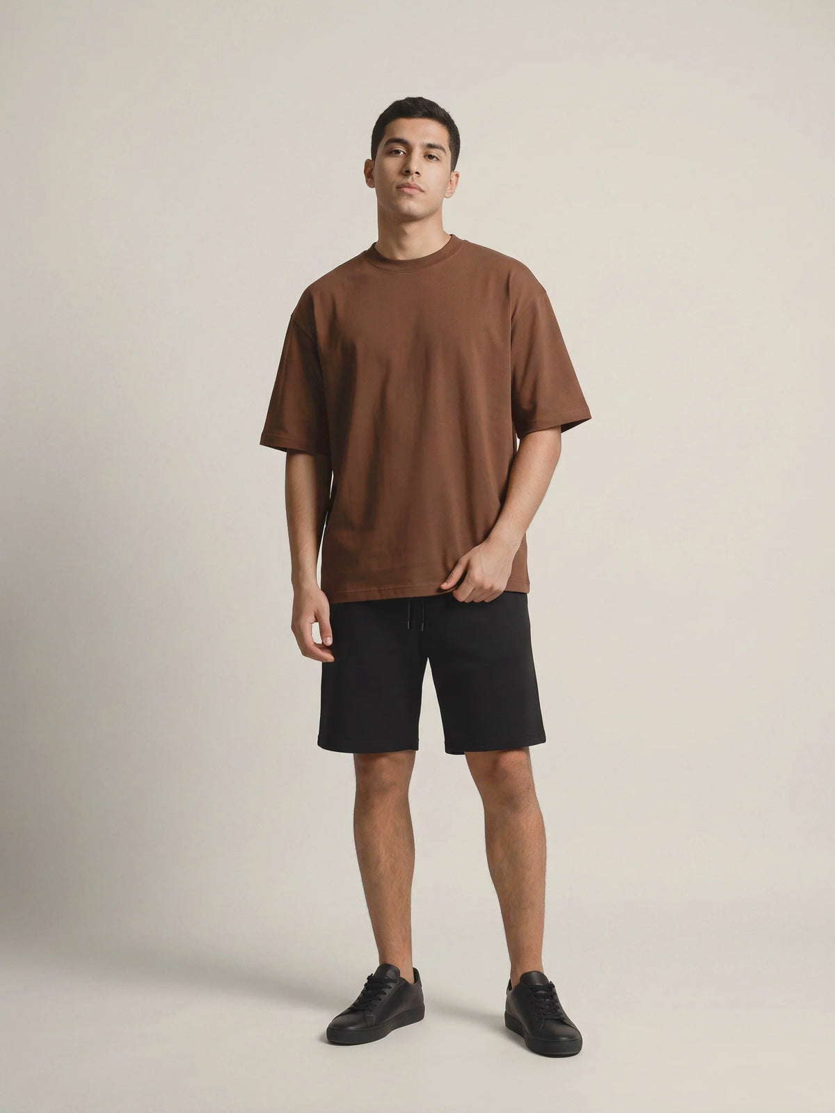 Chocolate heavyweight oversized t-shirt, Unidentity You Tee, full-length front view of the boxy fit with black Core shorts, streetwear #color_chocolate