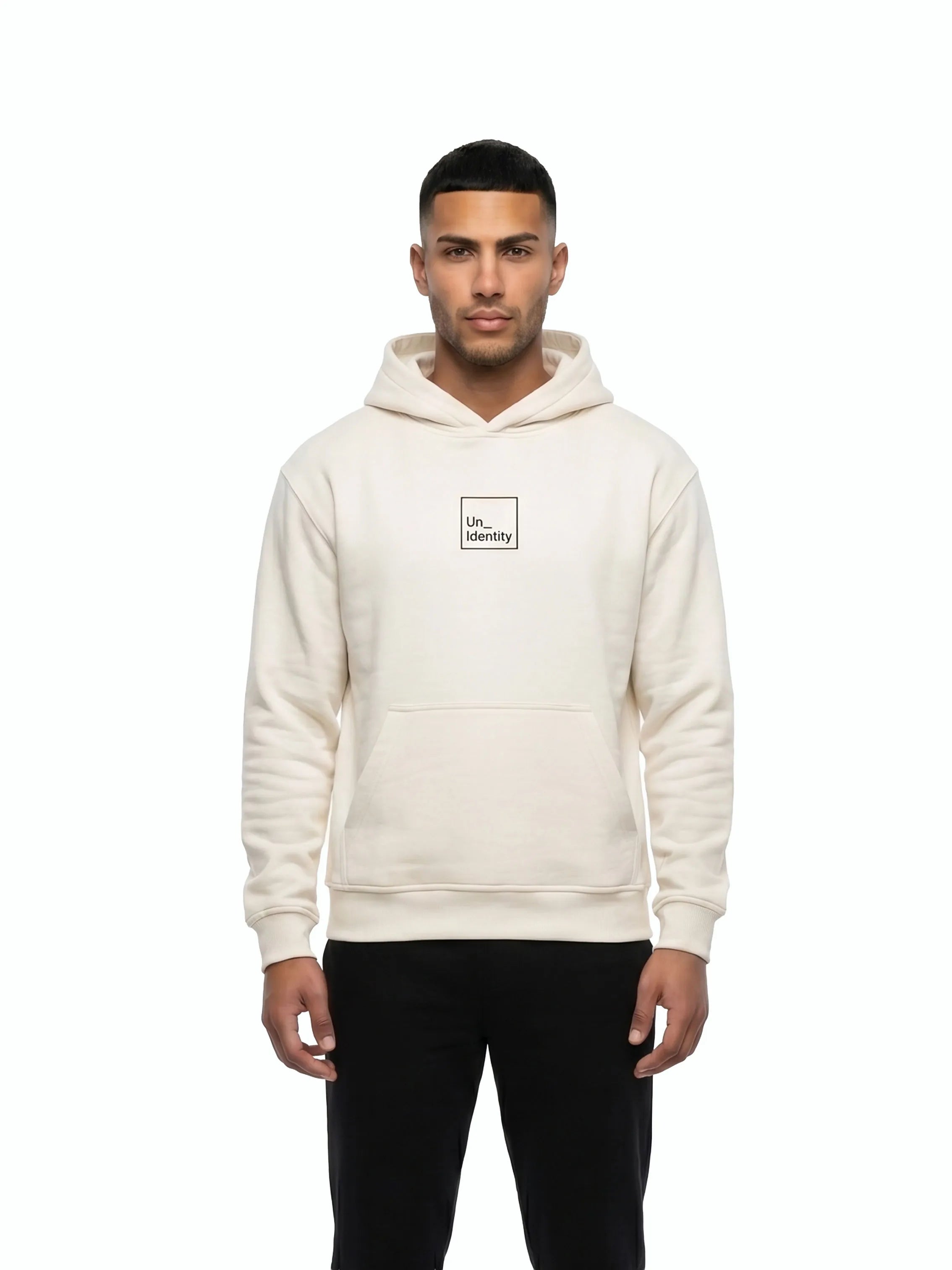 Man wearing white hoodie with black Unidentity logo on the chest. #color_white