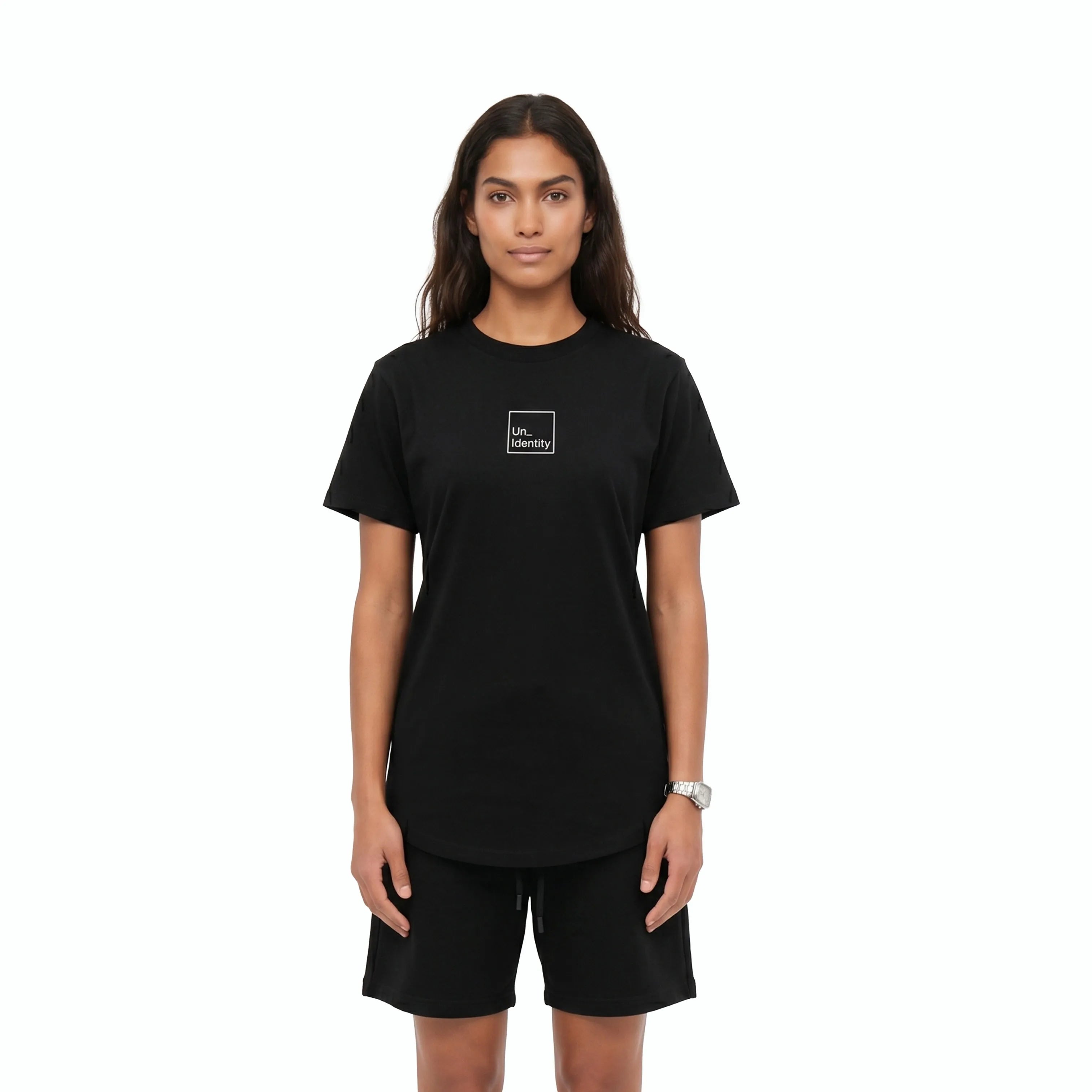 Person wearing black tee with white Unidentity logo on the chest. #color_black