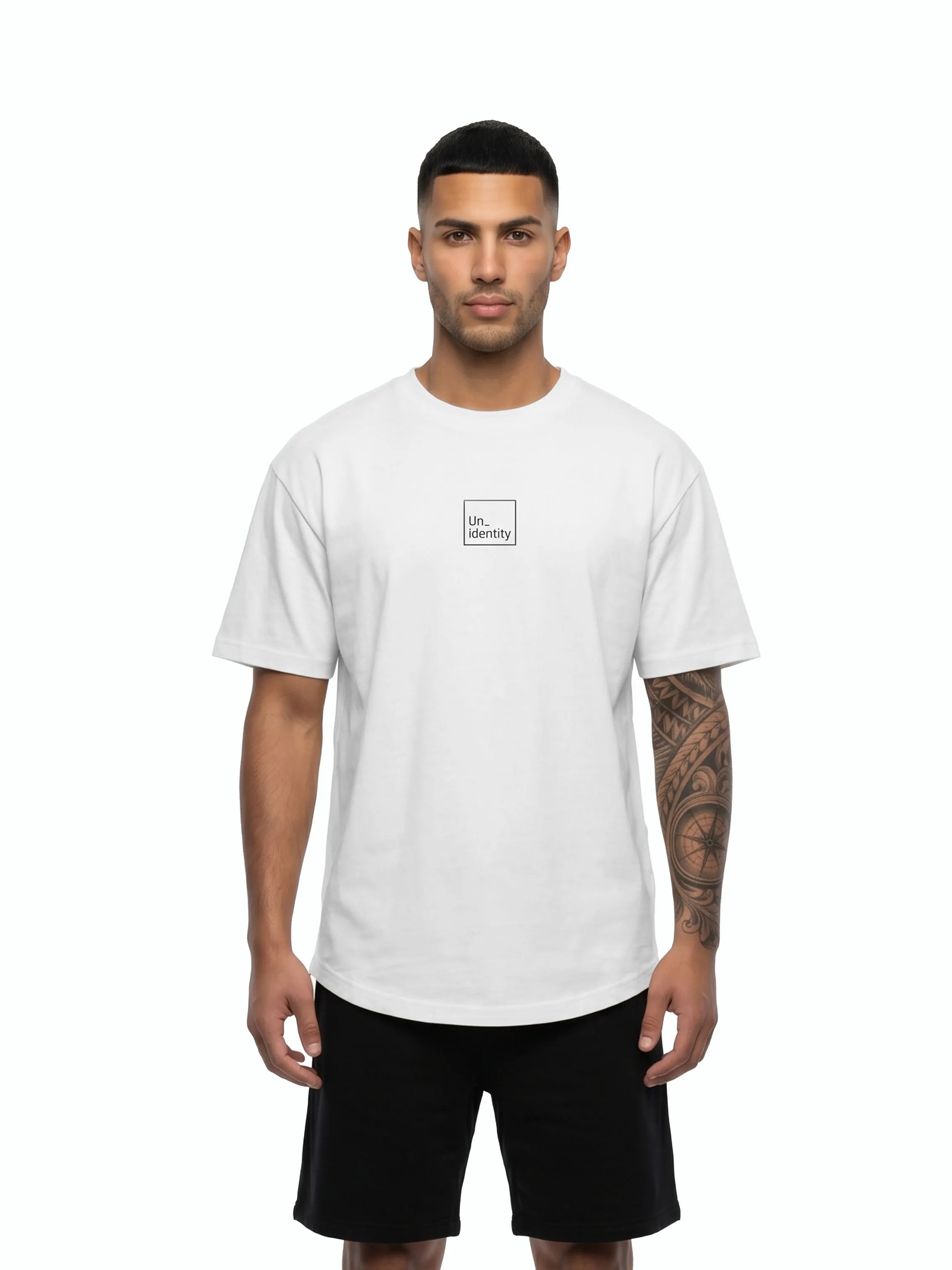 Person wearing white tee with black Unidentity logo on the chest. #color_white