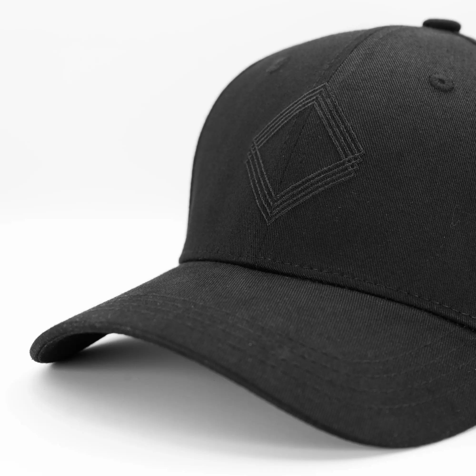 Black Unidentity baseball cap with gem logo and curved brim