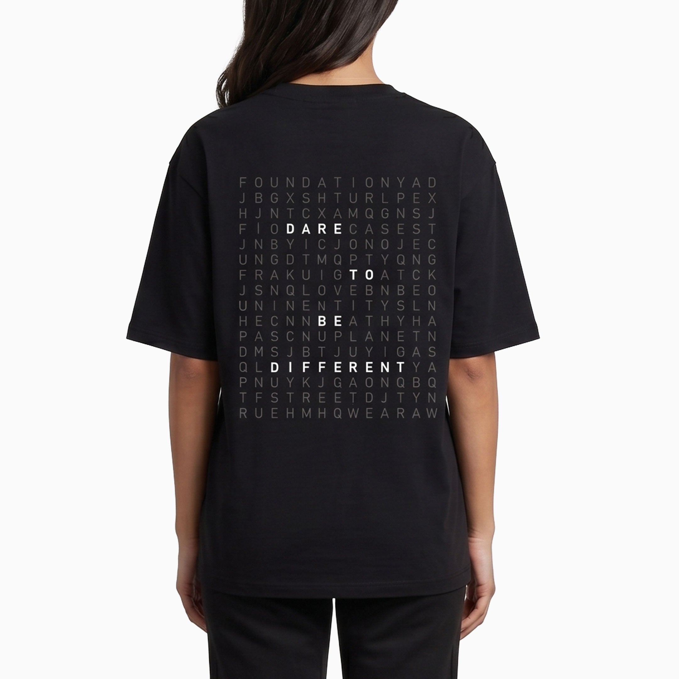 Black t-shirt with text design on the back, worn by a person. #color_black