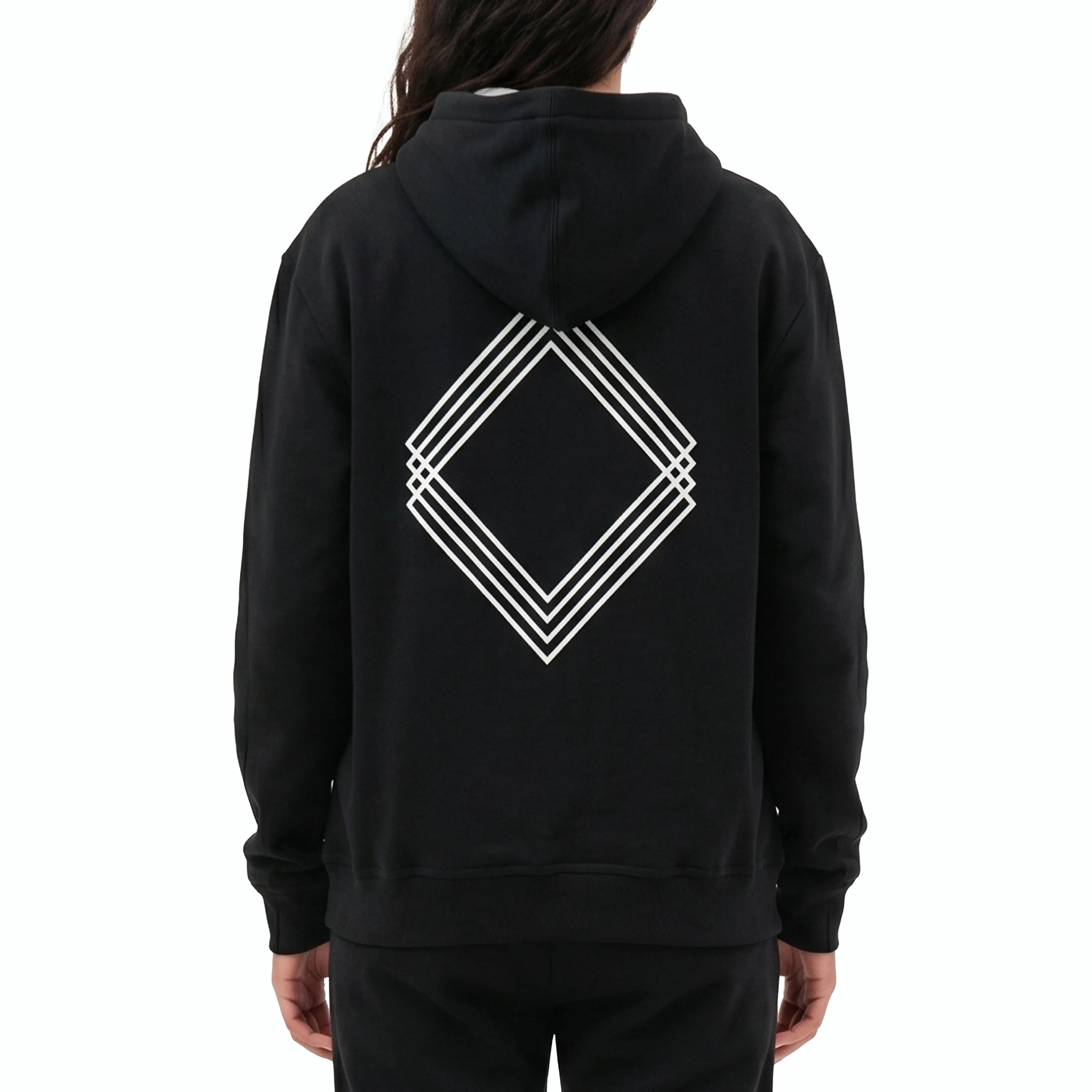 Person wearing black hoodie with white geometric design on the back. #color_black