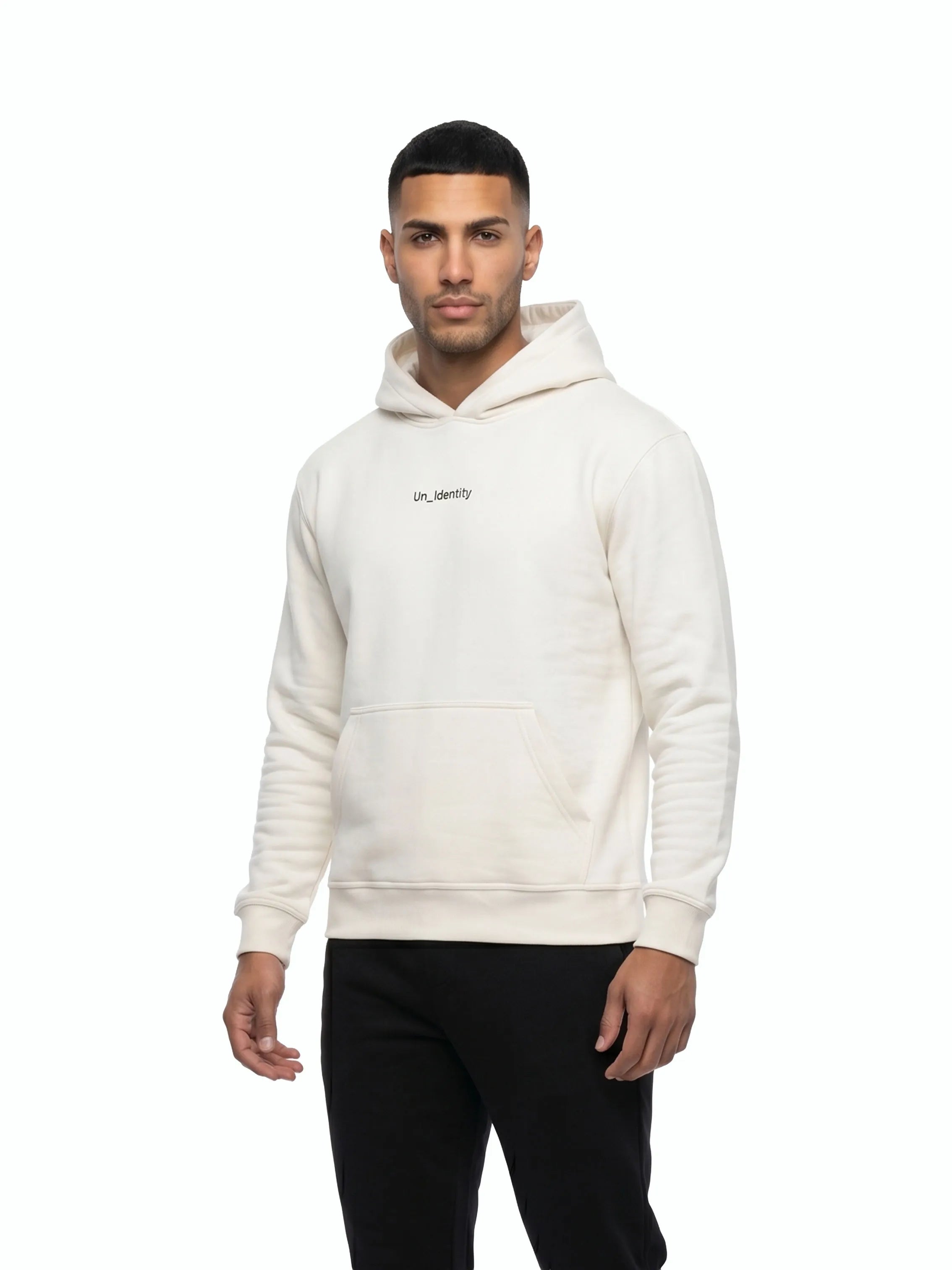 Model wearing white hoodie with Unidentity logo on the chest and black pants. #color_white