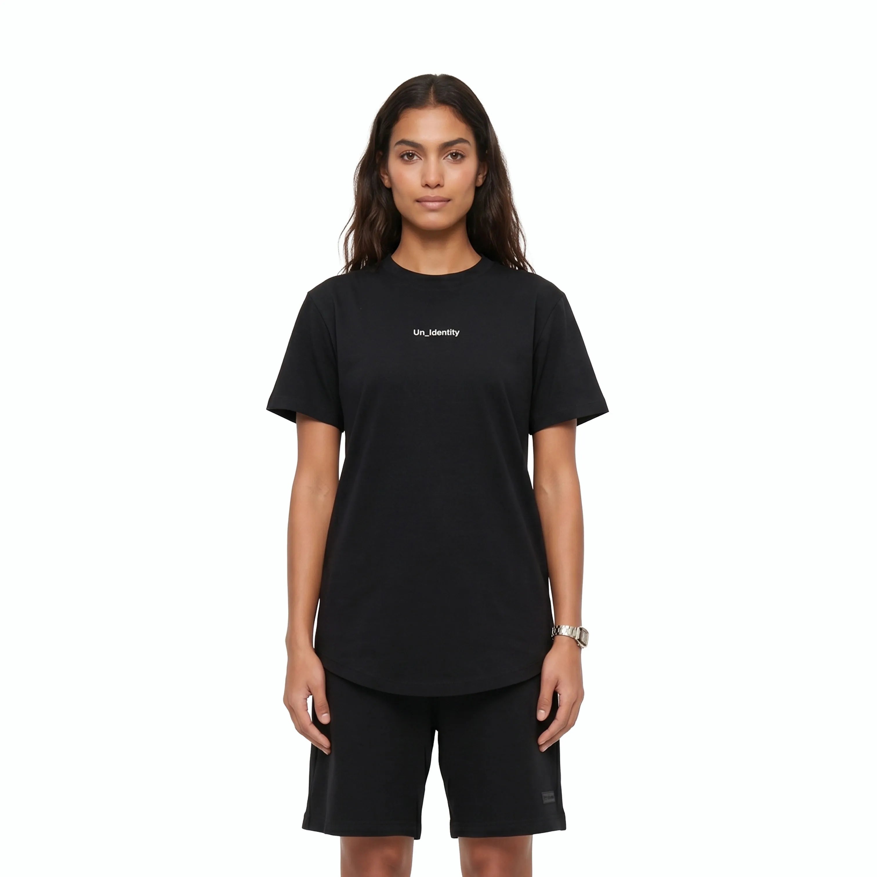 Woman wearing Unidentity black tee and joggers. #color_black