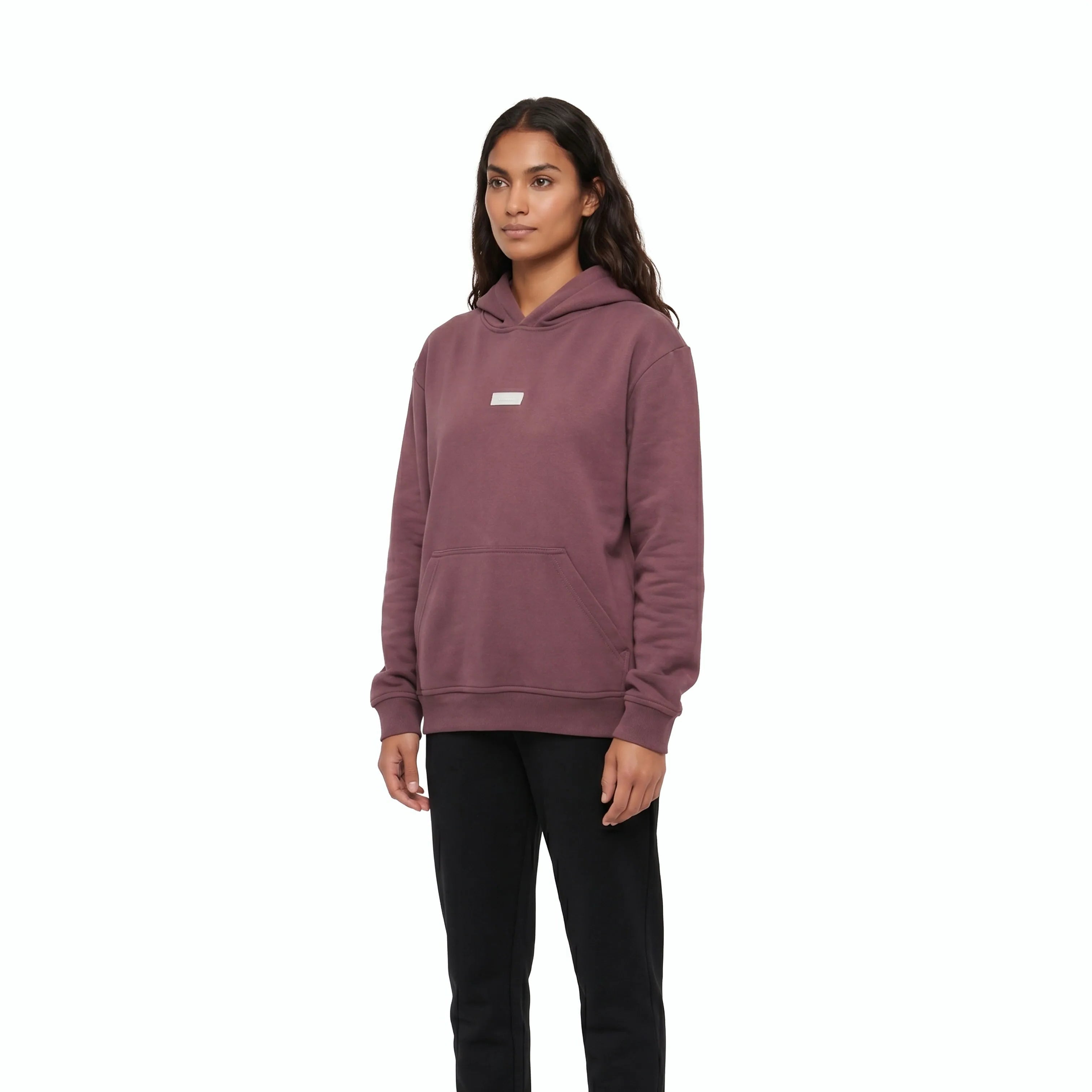 Woman wearing plum Unidentity hoodie and black pants. #color_plum