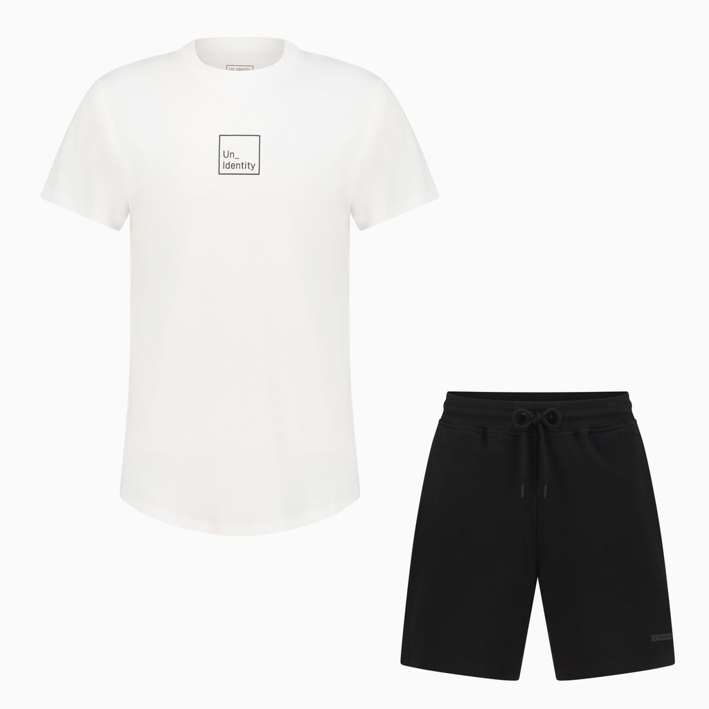 White Unidentity T-shirt and black shorts 