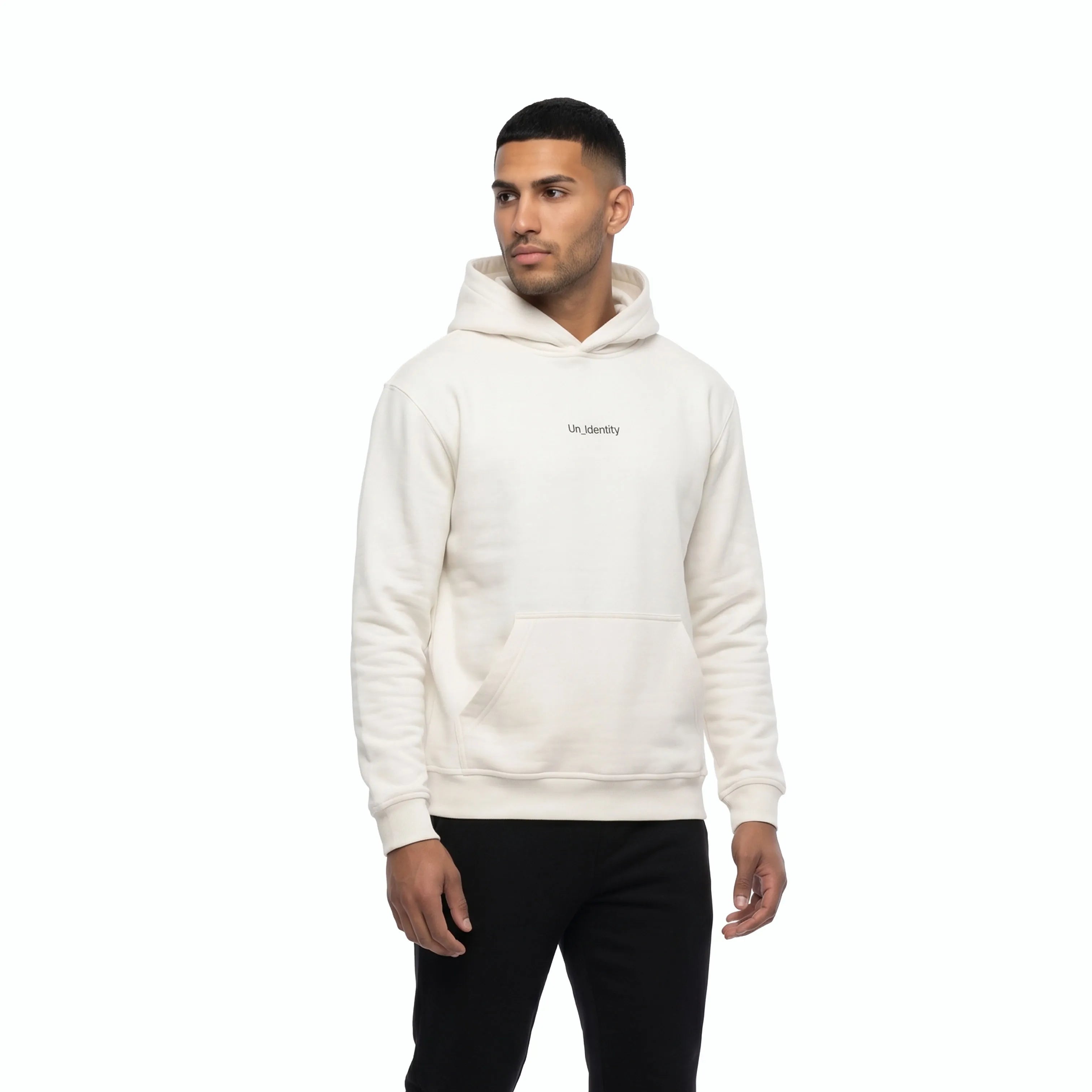 Man wearing white hoodie and black pants. #color_white