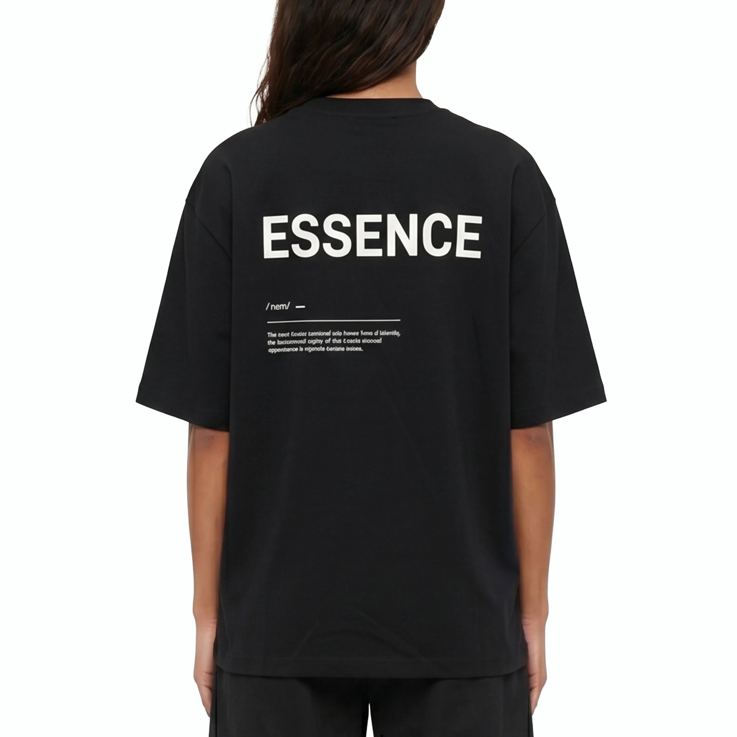 Person wearing black Unidentity T-shirt with ESSENCE printed on the back. #color_black