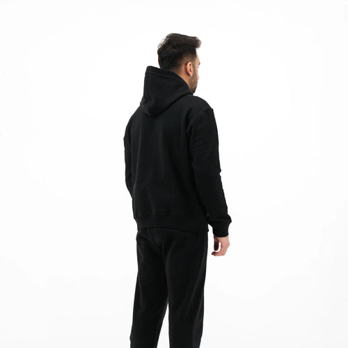 Black hoodie and pants on model 