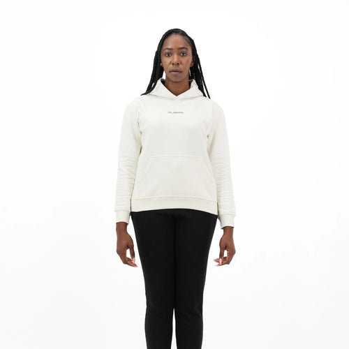 Model wearing white hoodie with Unidentity logo on the chest and black pants 