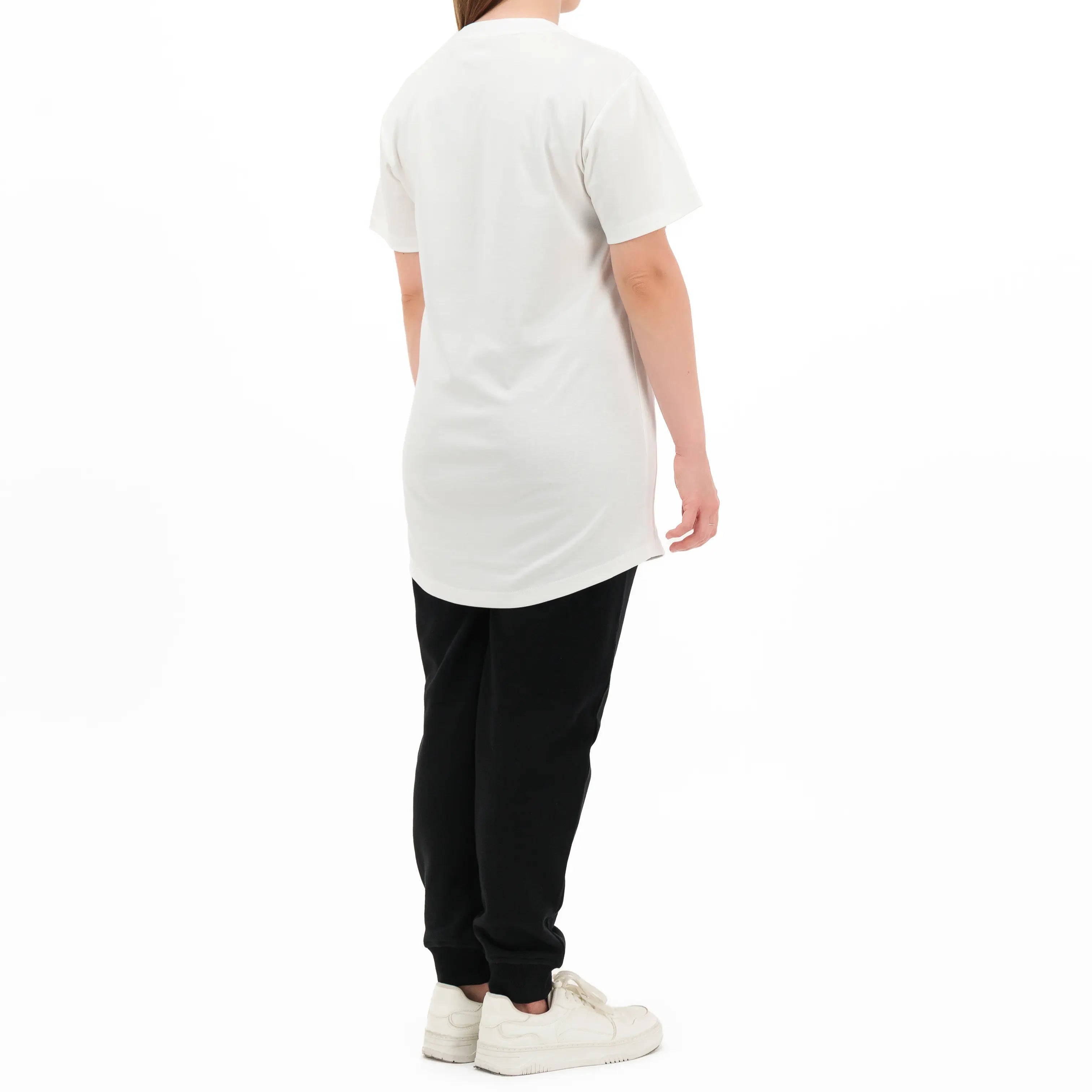 Model wearing white T-shirt, back view. #color_white