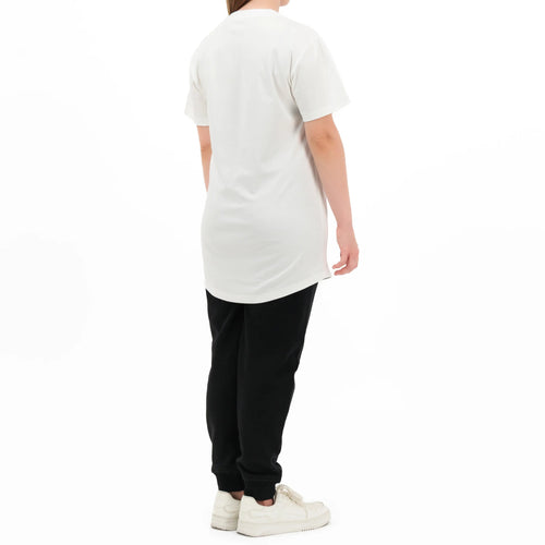 Model wearing white T-shirt, back view 
