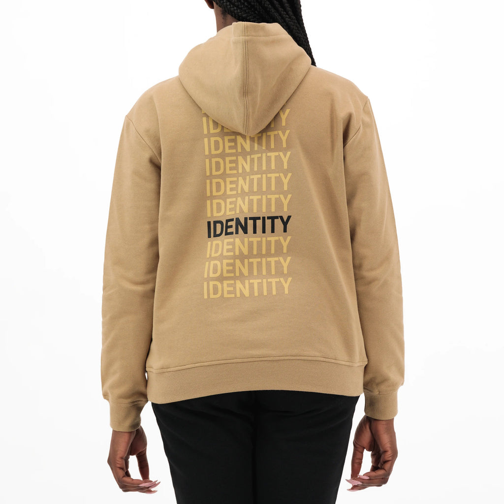 Beige hoodie with identity text on the back  on model