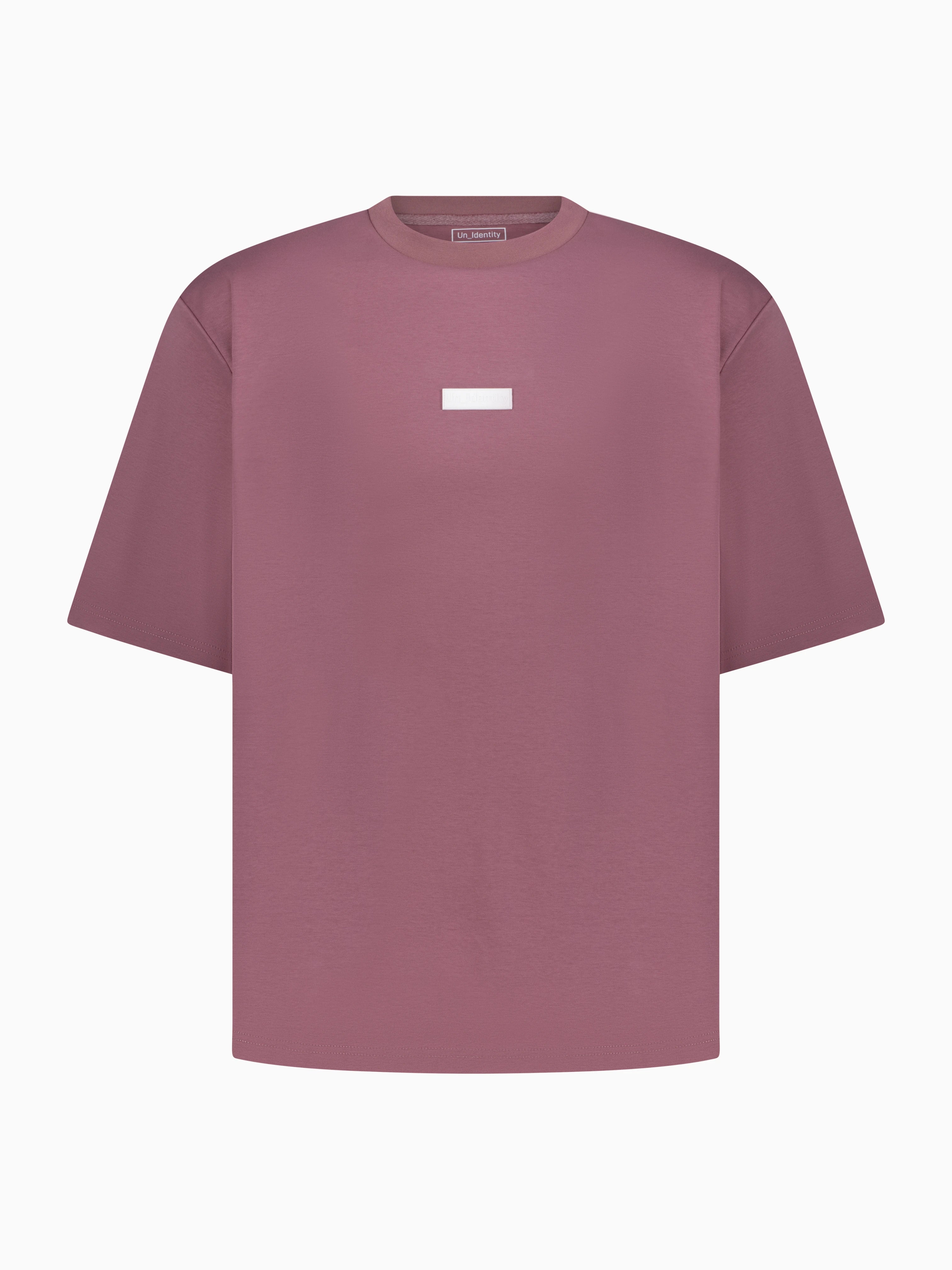 Mauve tee with small white Unidentity logo 3D patch on the chest 